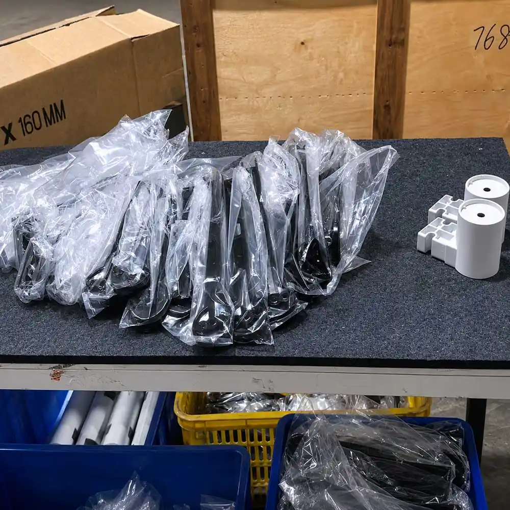 accessories arranged on a working table and photographed from three angles for packing verification